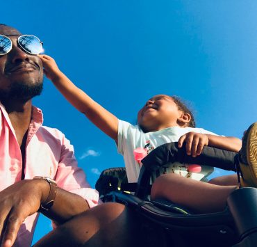 Dad with child in stroller