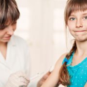 Girl receiving vaccine