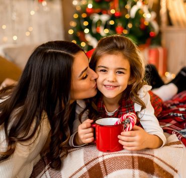 mother and child drinking hot cocoa