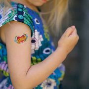 girl with fake mom tattoo