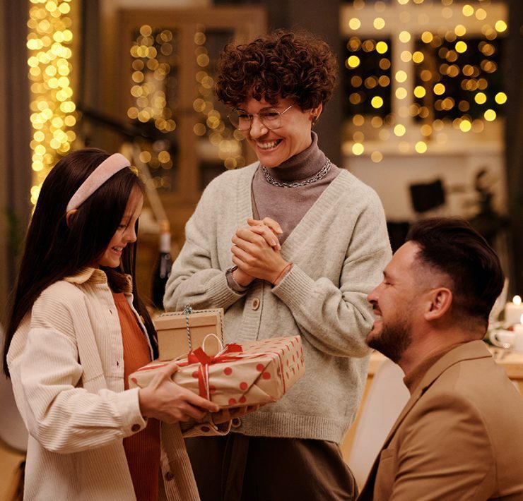 Little girl giving gift