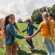 Happy kids holding hands
