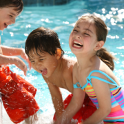 family at water park having fun