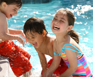 family at water park having fun