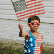 child celebrating America's 250th anniversary with patriotic activities