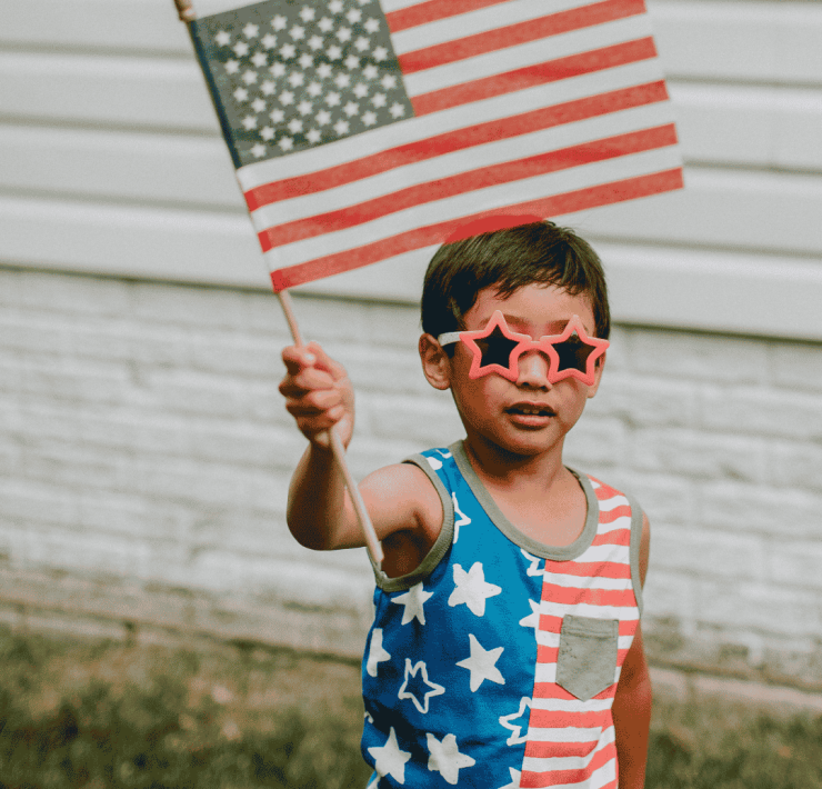 child celebrating America's 250th anniversary with patriotic activities