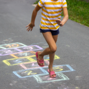 Children playing traditional games during a children's museum program in Texarkana